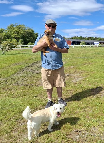 Hokitika resident Martin Bolland and friends Norma and Molly enjoying the new temporary Dog Park at Prossers Bush, Westland District Council